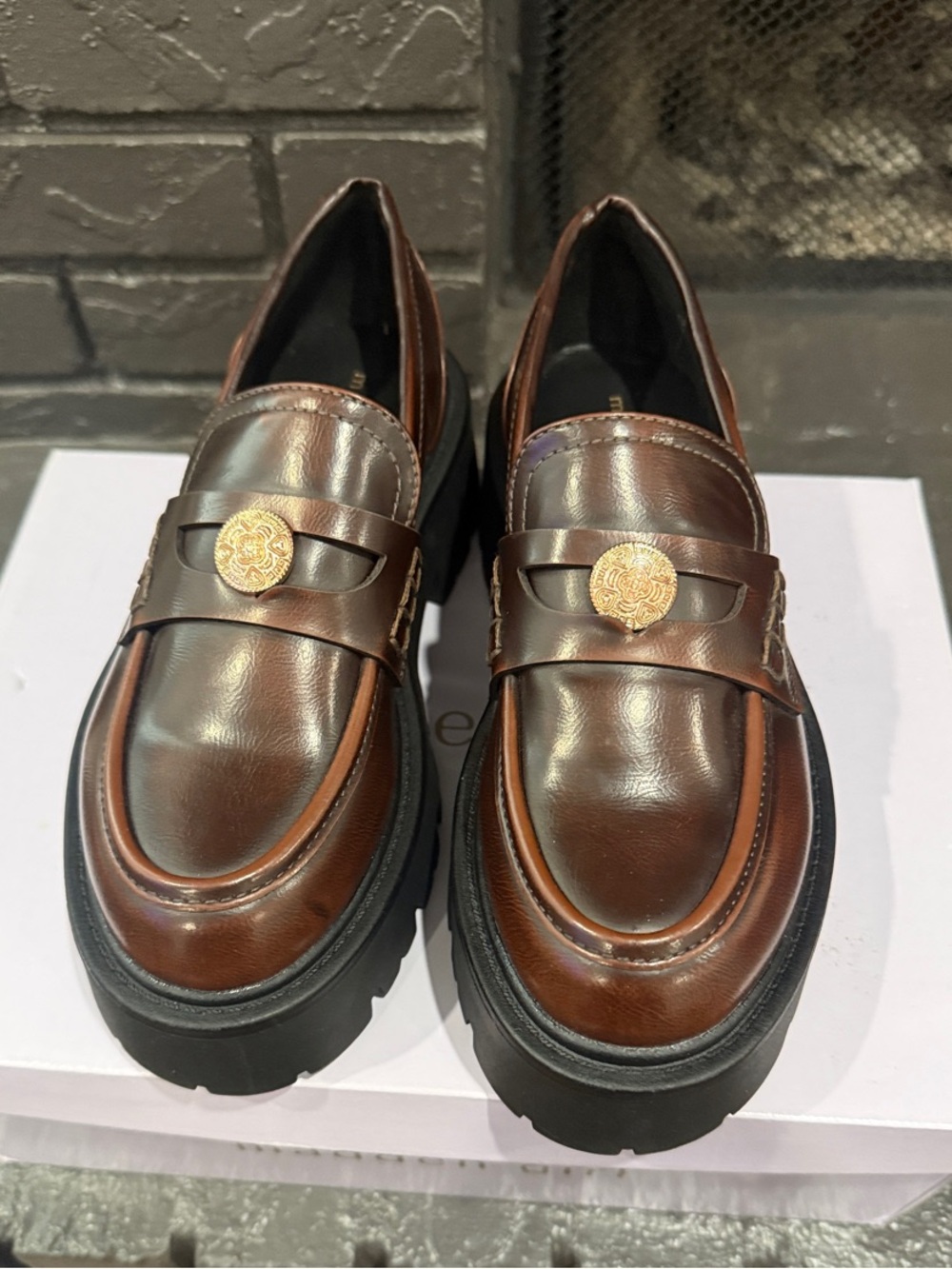 Madden Girl Brown Leather Lug Sole Penny Loafers with Gold Medallion